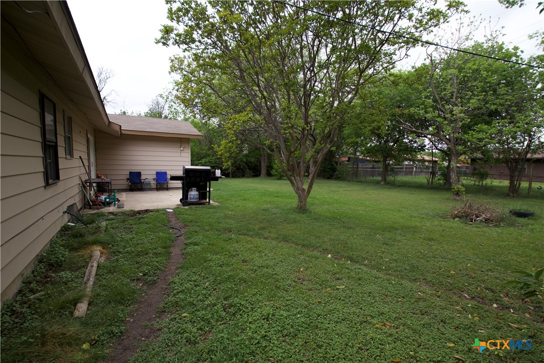 1411 West Lane Killeen, TX 76549 - Photo 34 of 36 a view of a backyard with a table and chairs