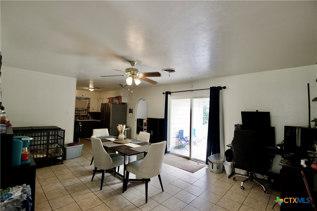 1411 West Lane Killeen, TX 76549 - Photo 6 of 36 a view of a workspace with furniture and a livingroom
