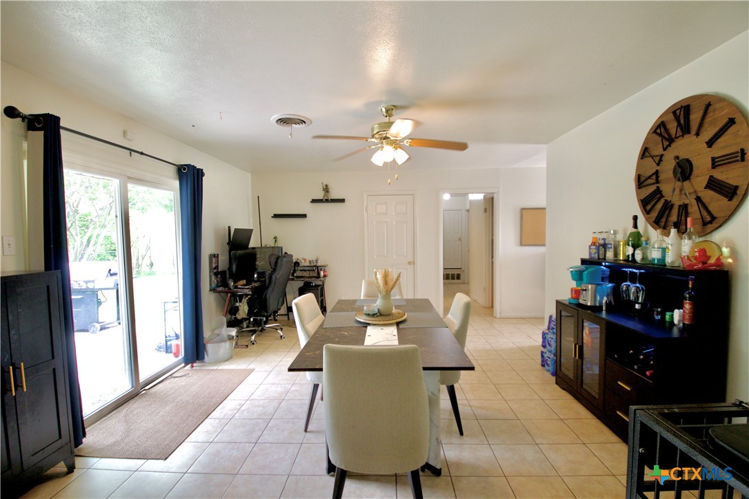 1411 West Lane Killeen, TX 76549 - Photo 8 of 36 a living room with furniture and a flat screen tv