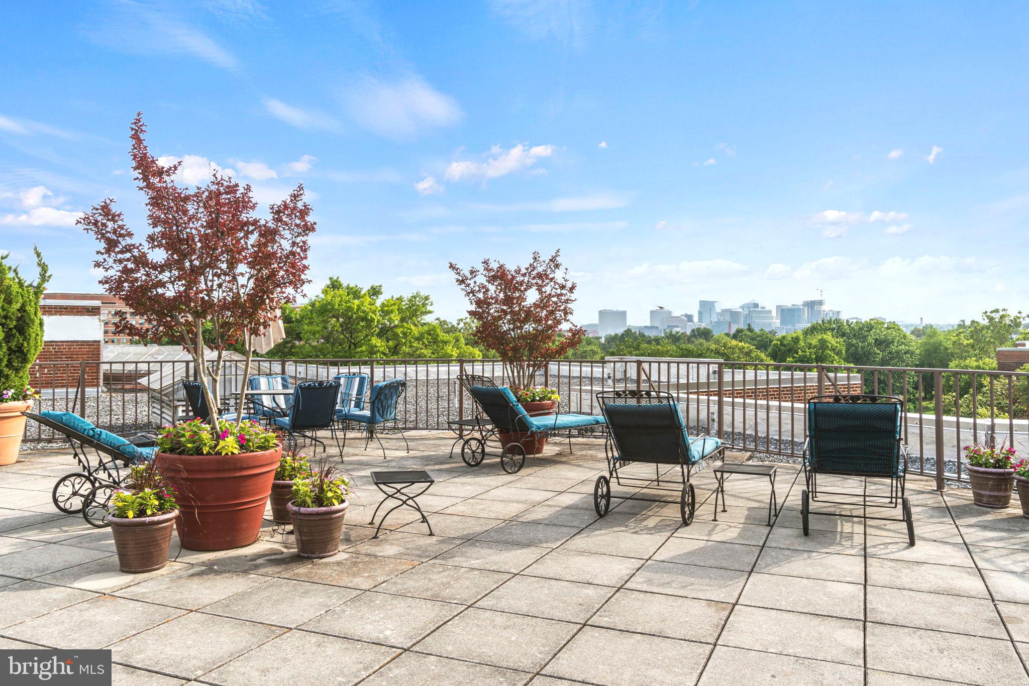 2500 Q Street Northwest, Unit 206 Washington, DC 20007 - Photo 15 of 21 a view of a terrace with furniture