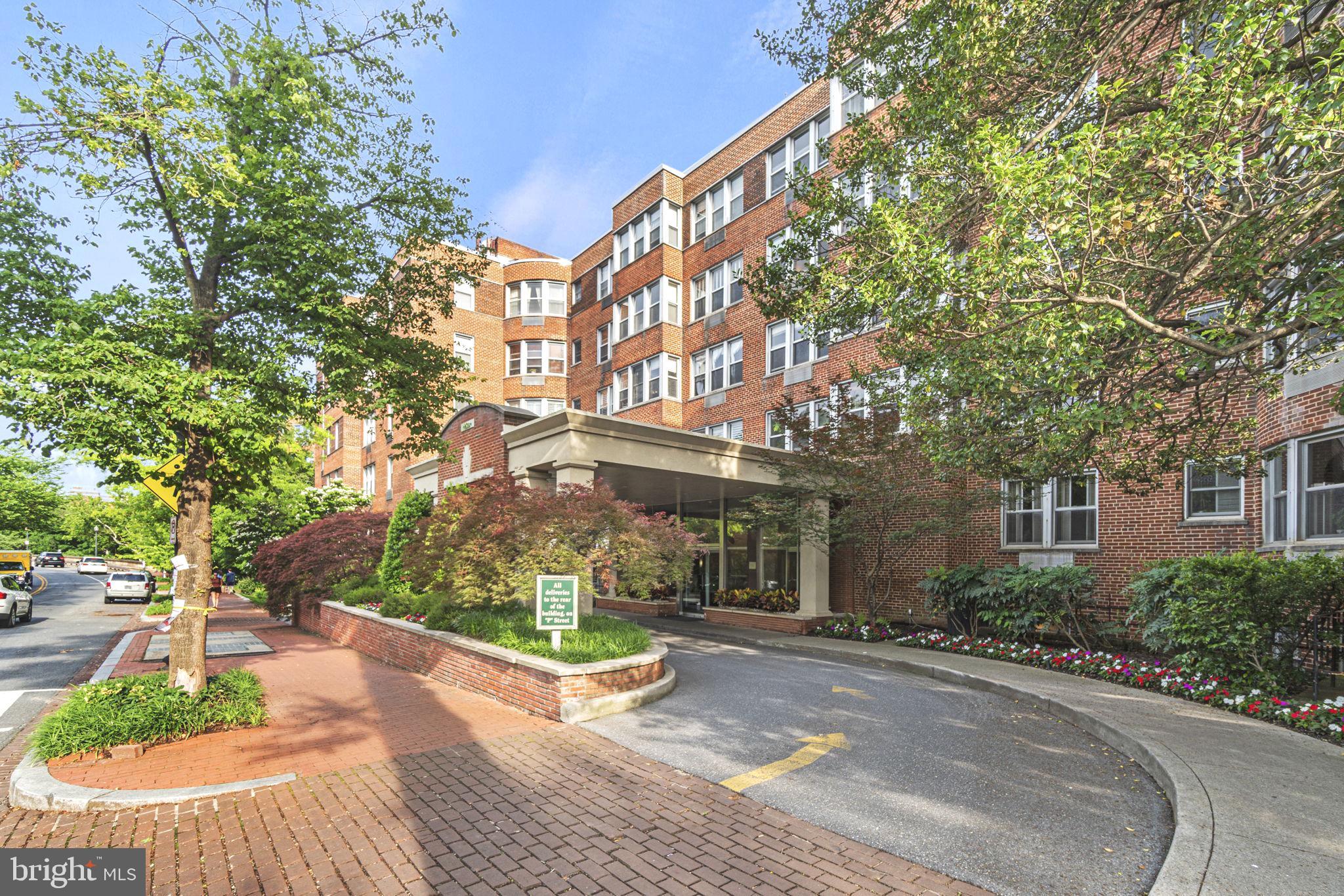2500 Q Street Northwest, Unit 206 Washington, DC 20007 - Photo 19 of 21 a view of a building with a yard