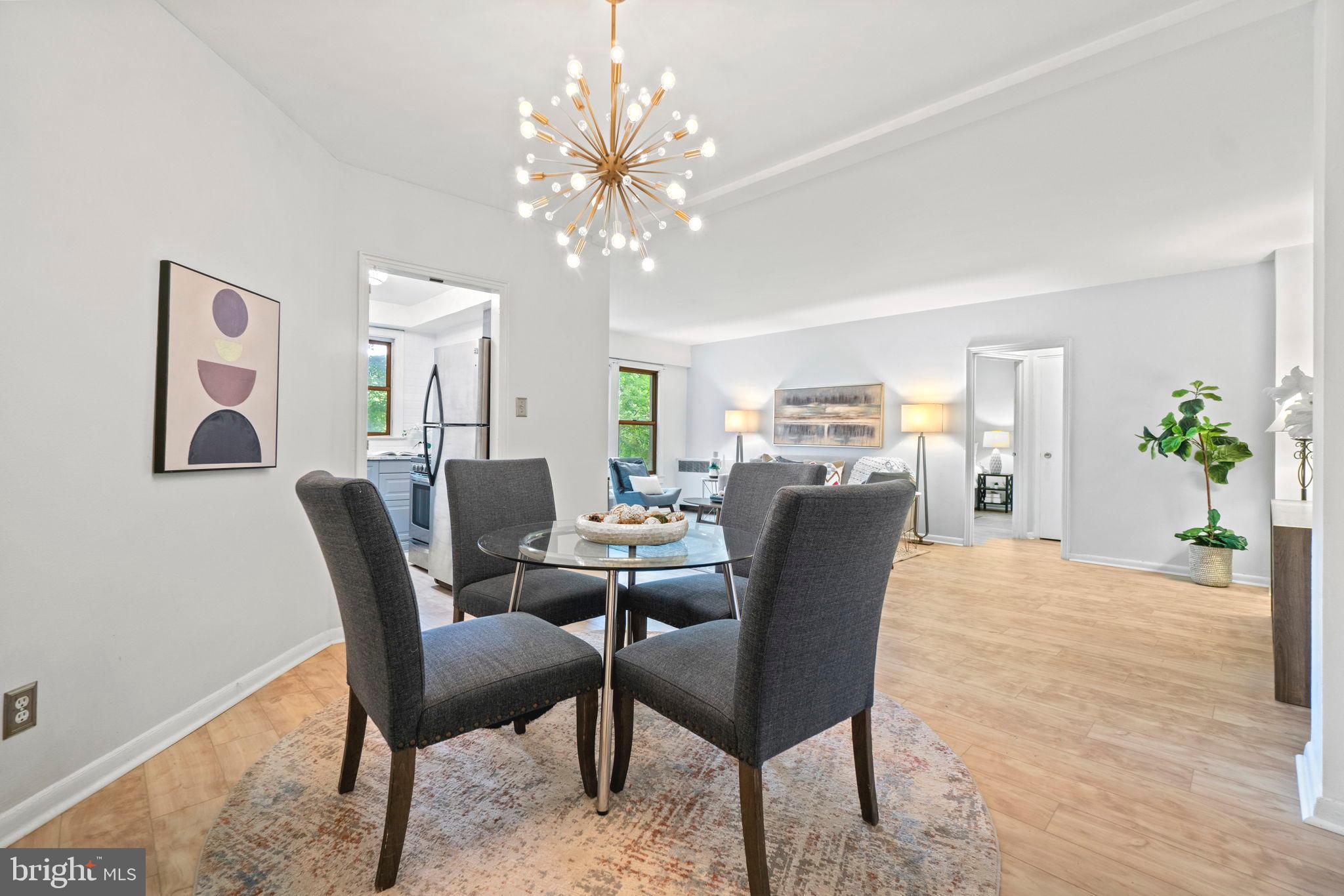 2500 Q Street Northwest, Unit 206 Washington, DC 20007 - Photo 4 of 21 a view of a dining room with furniture