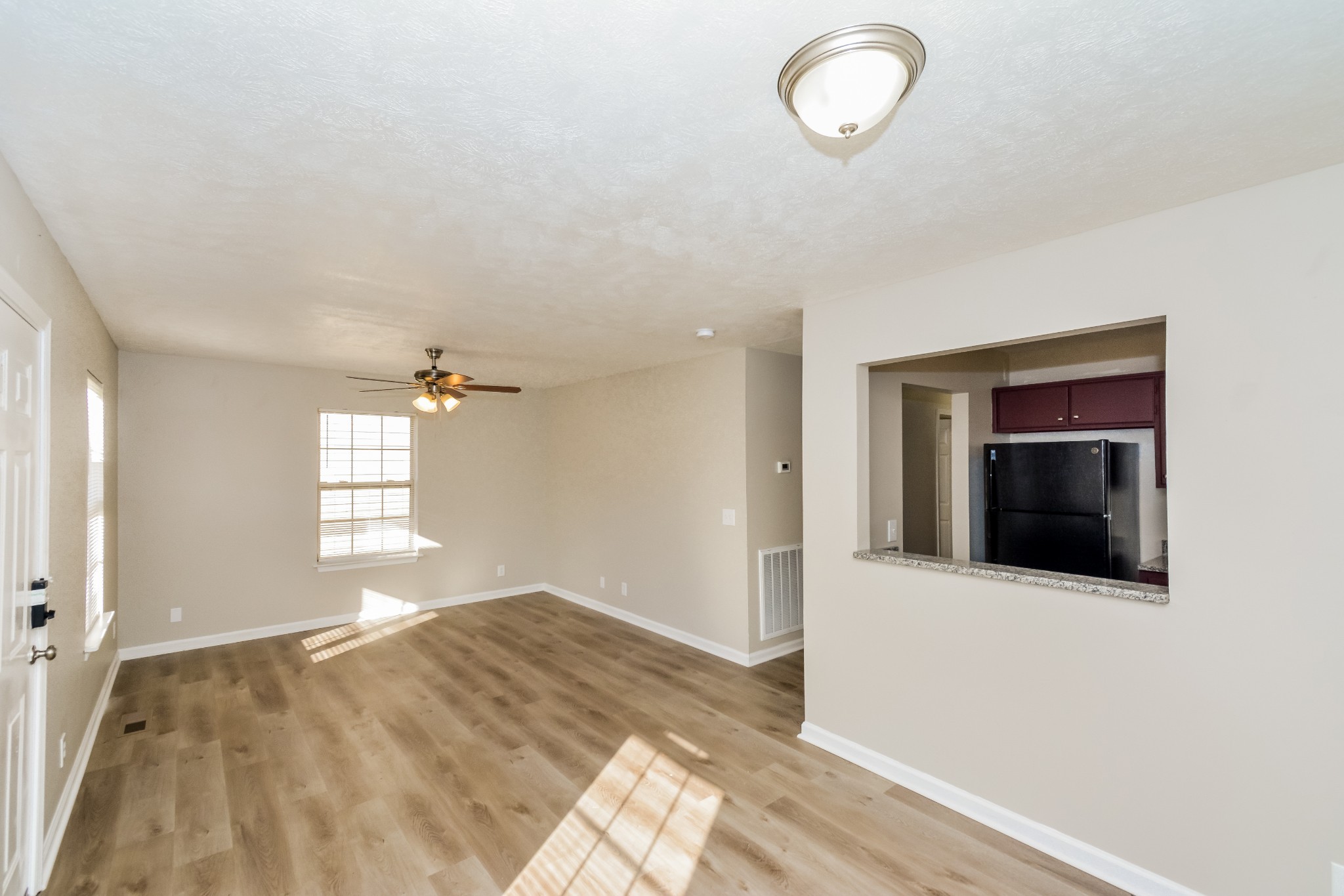 2607 Landrum Court, Unit LOT 7 Springfield, TN 37172 - Photo 4 of 16 a view of empty room with window and wooden floor
