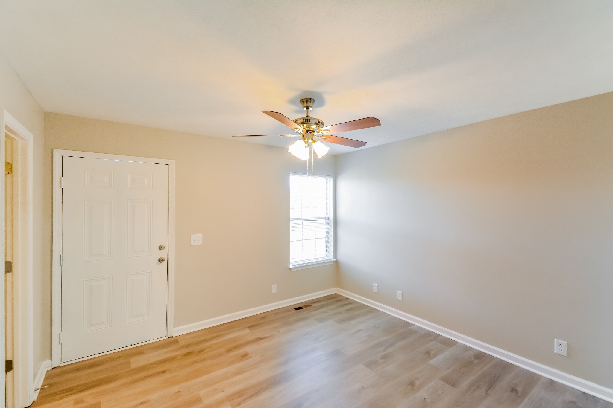 2607 Landrum Court, Unit LOT 7 Springfield, TN 37172 - Photo 6 of 16 wooden floor in an empty room with a window