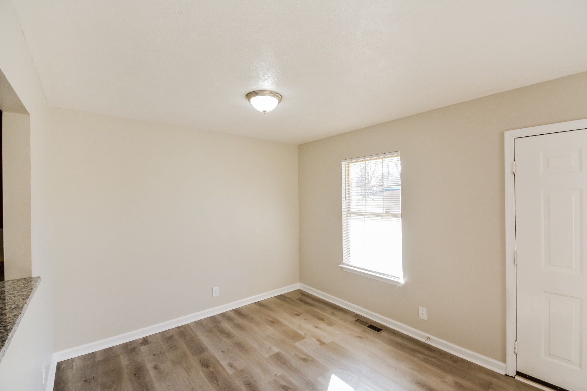 2607 Landrum Court, Unit LOT 7 Springfield, TN 37172 - Photo 9 of 16 an empty room with a window
