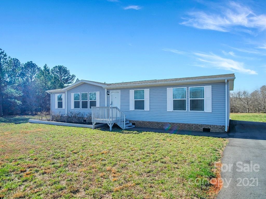 2954 Fish Pond Road Cherryville, NC 28021 - Photo 2 of 32 a view of a house with a big yard