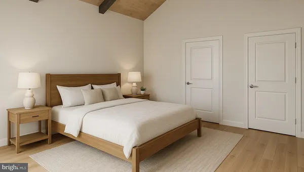 a bedroom with a bed and a table