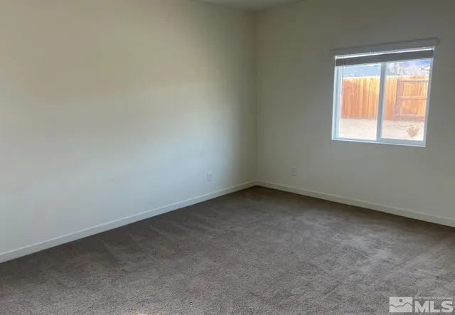 a bathroom with a shower sink and mirror