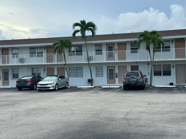 a car parked in front of a building