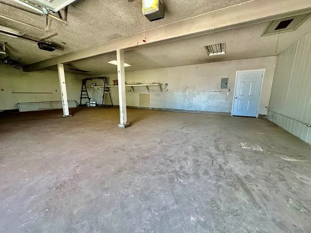 a view of a room with wooden wall