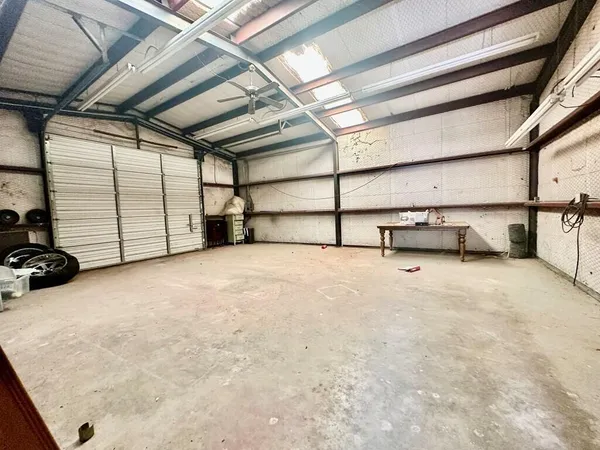 a view of a garage with furniture