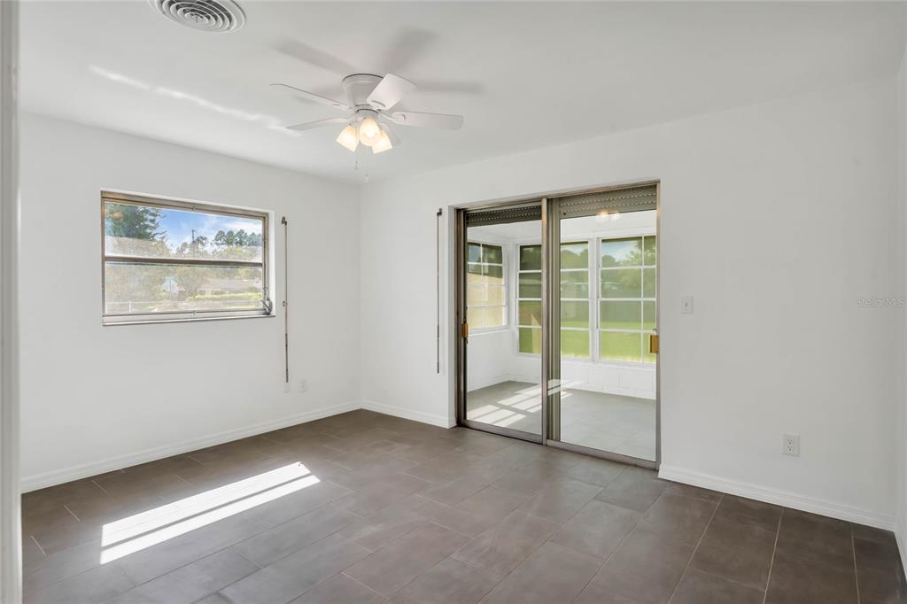 448 Ridge Drive Sanford, FL 32773 - Photo 15 of 20 a view of an empty room with a window