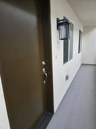 a view of a hallway with closet