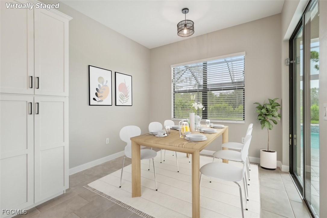 11674 Russet Trail Fort Myers, FL 33913 - Photo 12 of 47 a view of a dining room with furniture window and outside view
