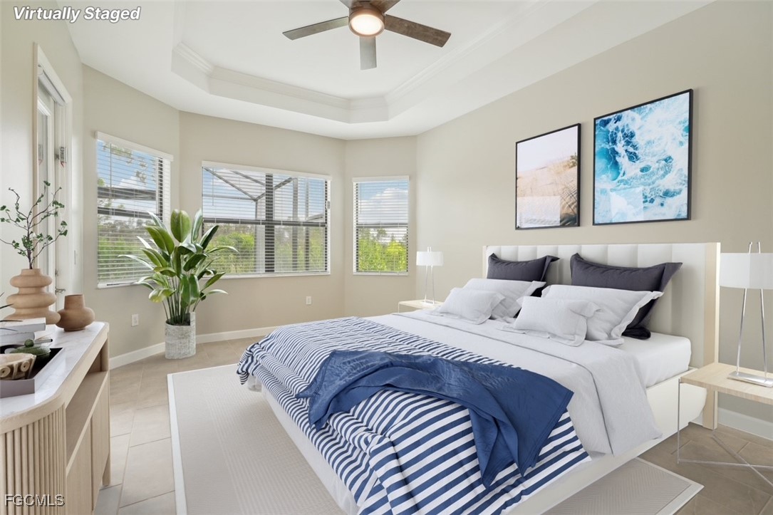 11674 Russet Trail Fort Myers, FL 33913 - Photo 13 of 47 a bedroom with bed and a chandelier