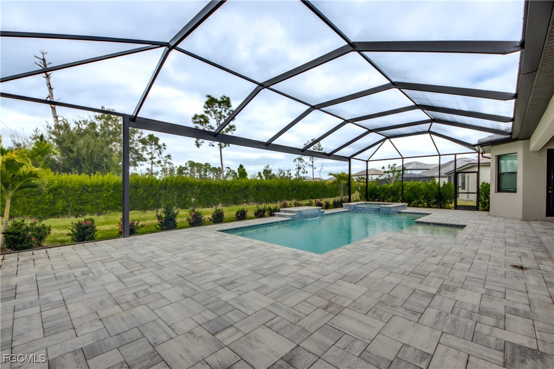 11674 Russet Trail Fort Myers, FL 33913 - Photo 24 of 47 a view of a swimming pool with a porch