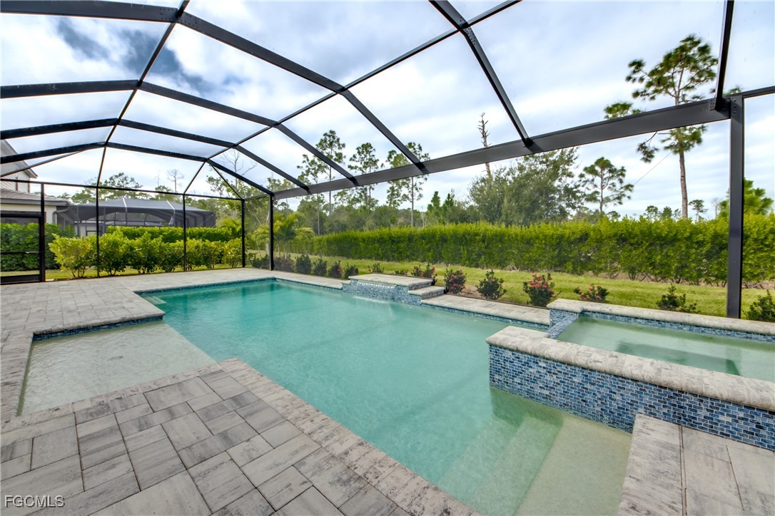 11674 Russet Trail Fort Myers, FL 33913 - Photo 26 of 47 a view of swimming pool with a yard