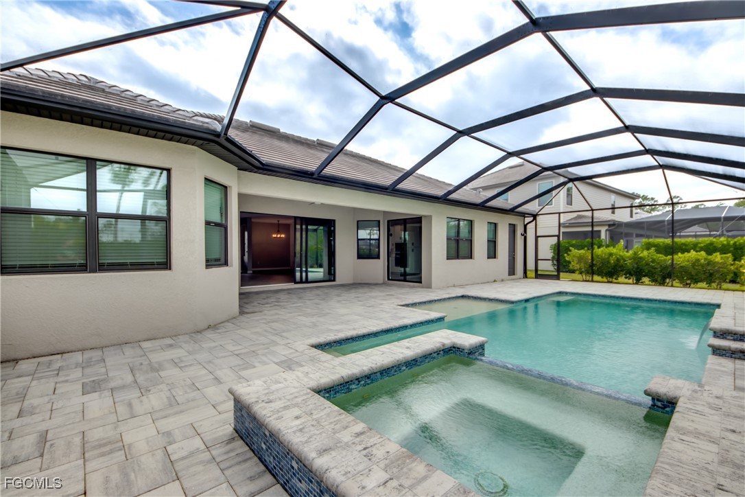11674 Russet Trail Fort Myers, FL 33913 - Photo 28 of 47 a view of a house with pool