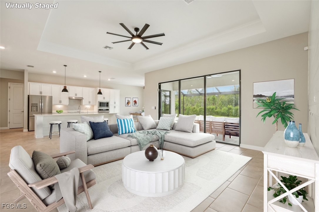 11674 Russet Trail Fort Myers, FL 33913 - Photo 3 of 47 a living room with furniture and a large window