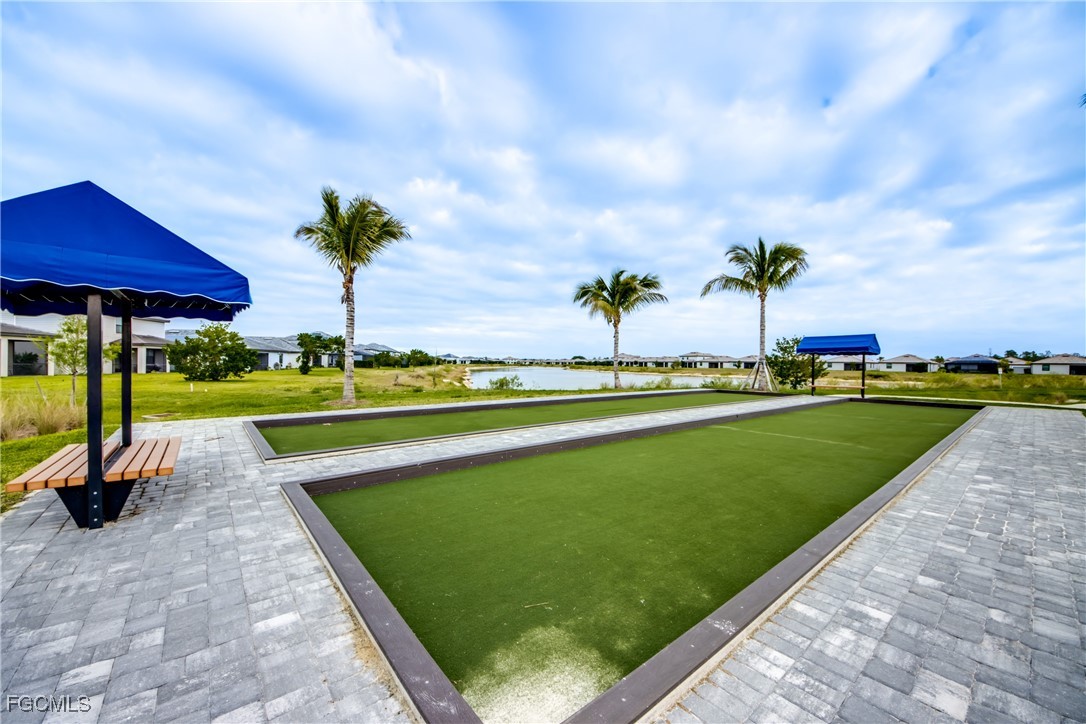 11674 Russet Trail Fort Myers, FL 33913 - Photo 31 of 47 a view of a swimming pool and lounge chairs in back yard