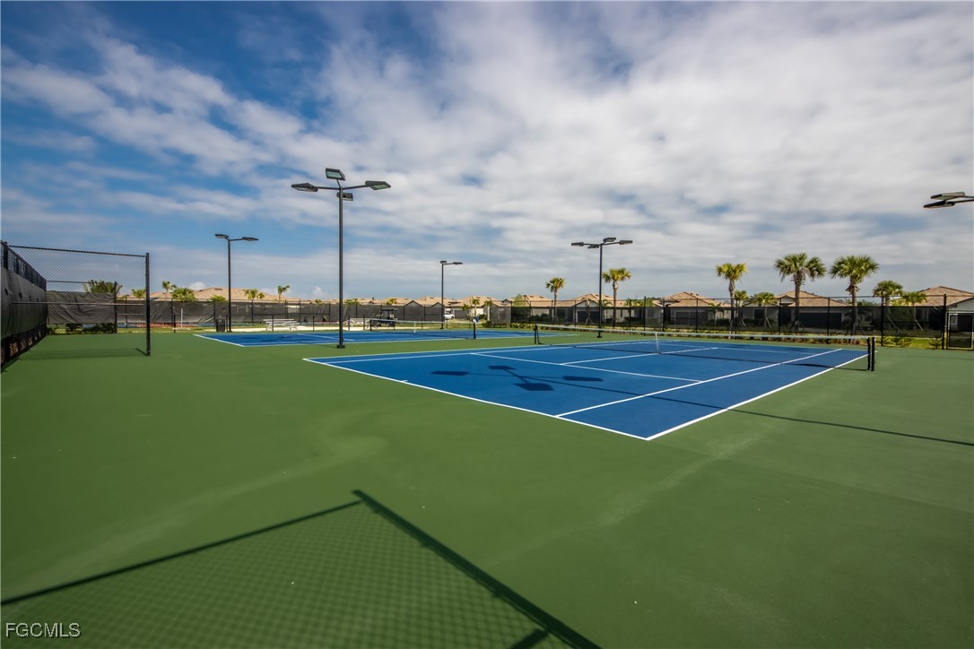 11674 Russet Trail Fort Myers, FL 33913 - Photo 38 of 47 a view of a tennis court