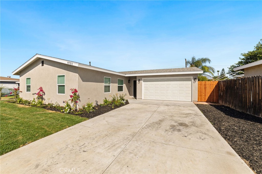 9751 Indiana Avenue Riverside, CA 92503 - Photo 1 of 1 a view of a house with a yard
