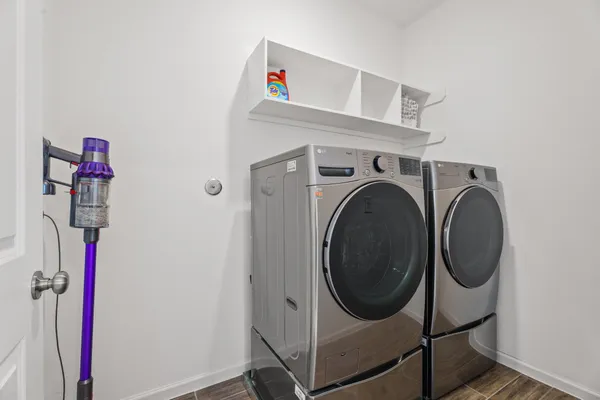 a utility room with dryer and washer