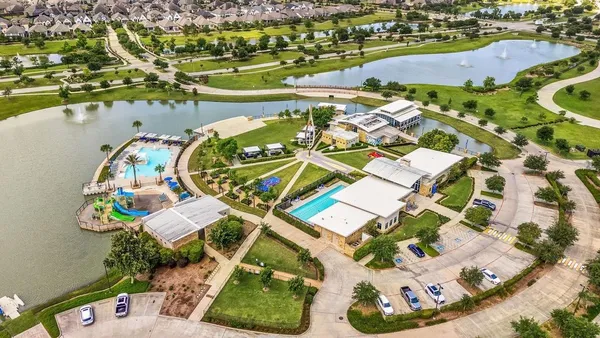 aerial view of a house with a swimming pool