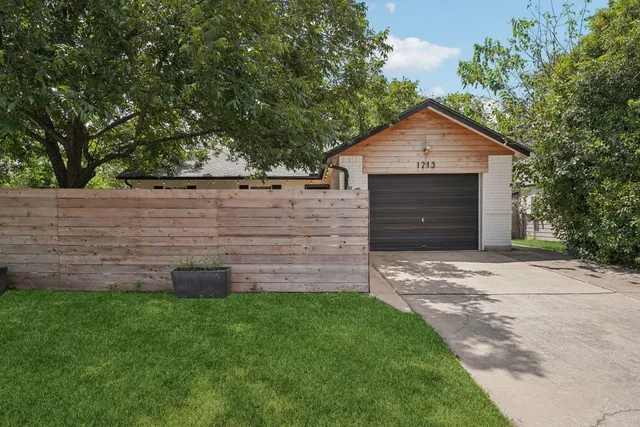 a view of a backyard of the house