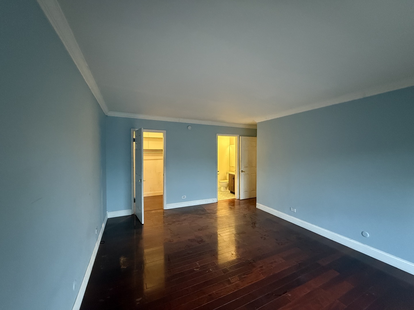 7 East Carriageway Drive, Unit 311 Hazel Crest, IL 60429 - Photo 16 of 17 a view of an empty room with window and wooden floor