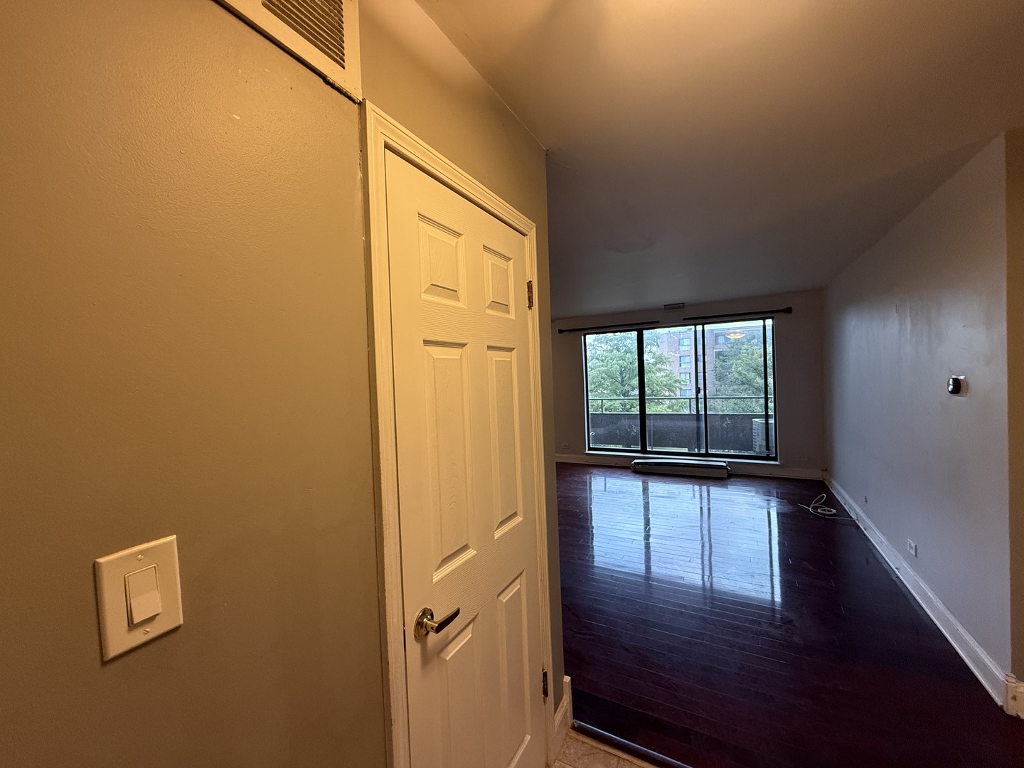 7 East Carriageway Drive, Unit 311 Hazel Crest, IL 60429 - Photo 2 of 17 a view of front door with wooden floor