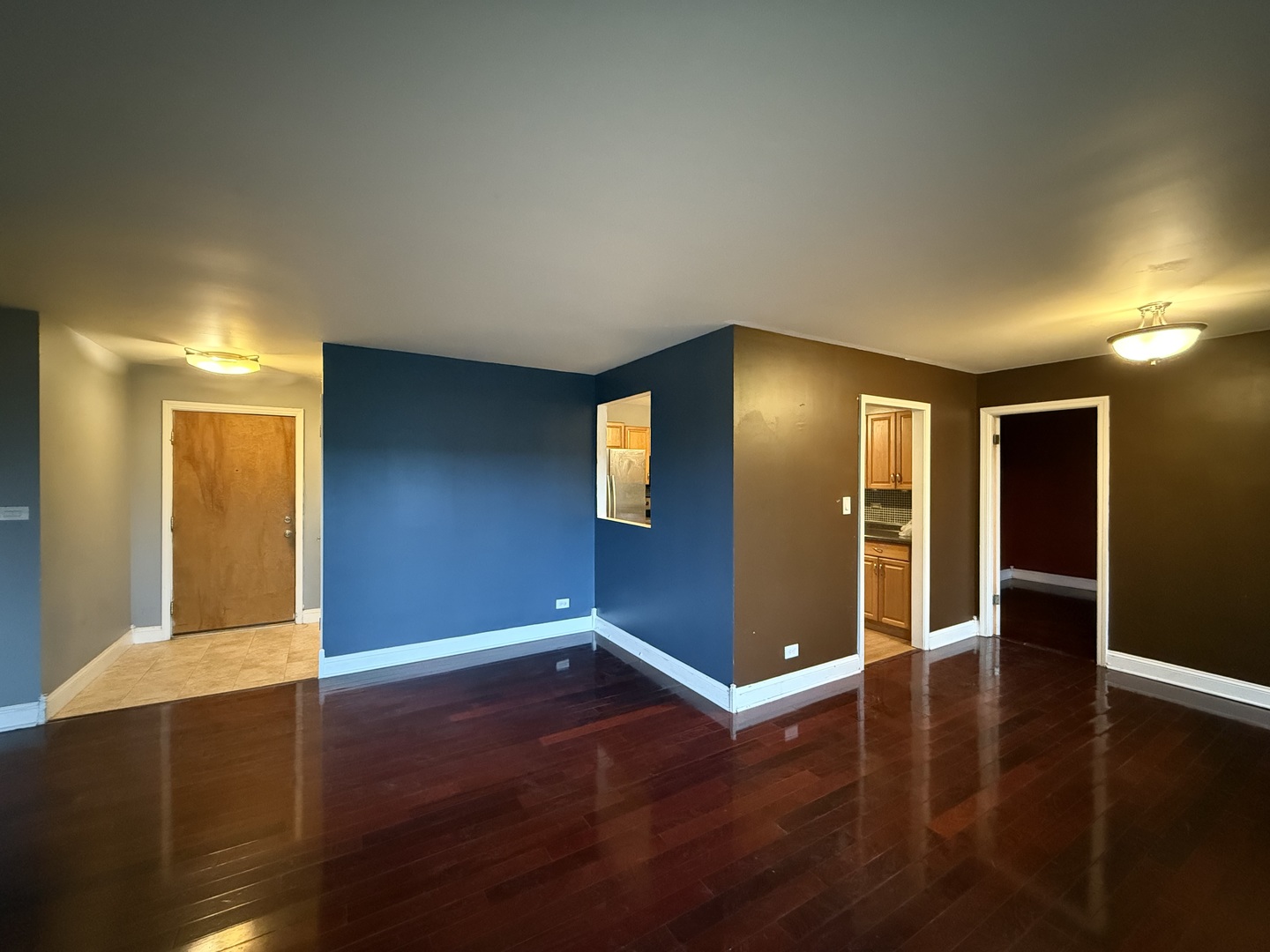 7 East Carriageway Drive, Unit 311 Hazel Crest, IL 60429 - Photo 6 of 17 a view of an empty room with wooden floor and closet