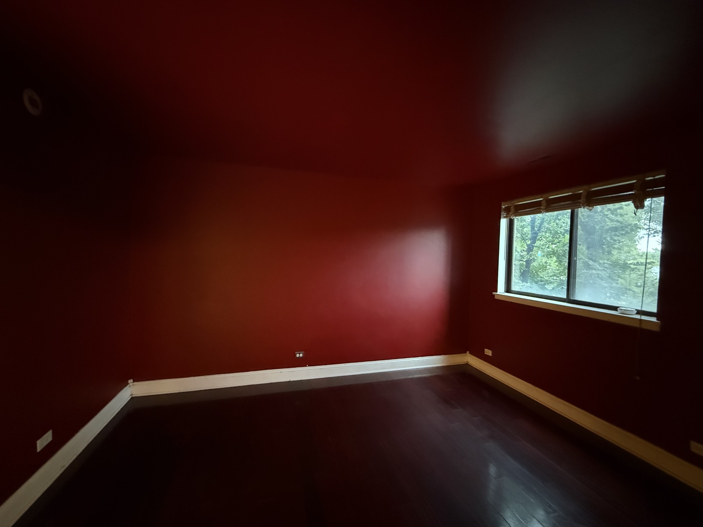 7 East Carriageway Drive, Unit 311 Hazel Crest, IL 60429 - Photo 9 of 17 an empty room with wooden floor and windows