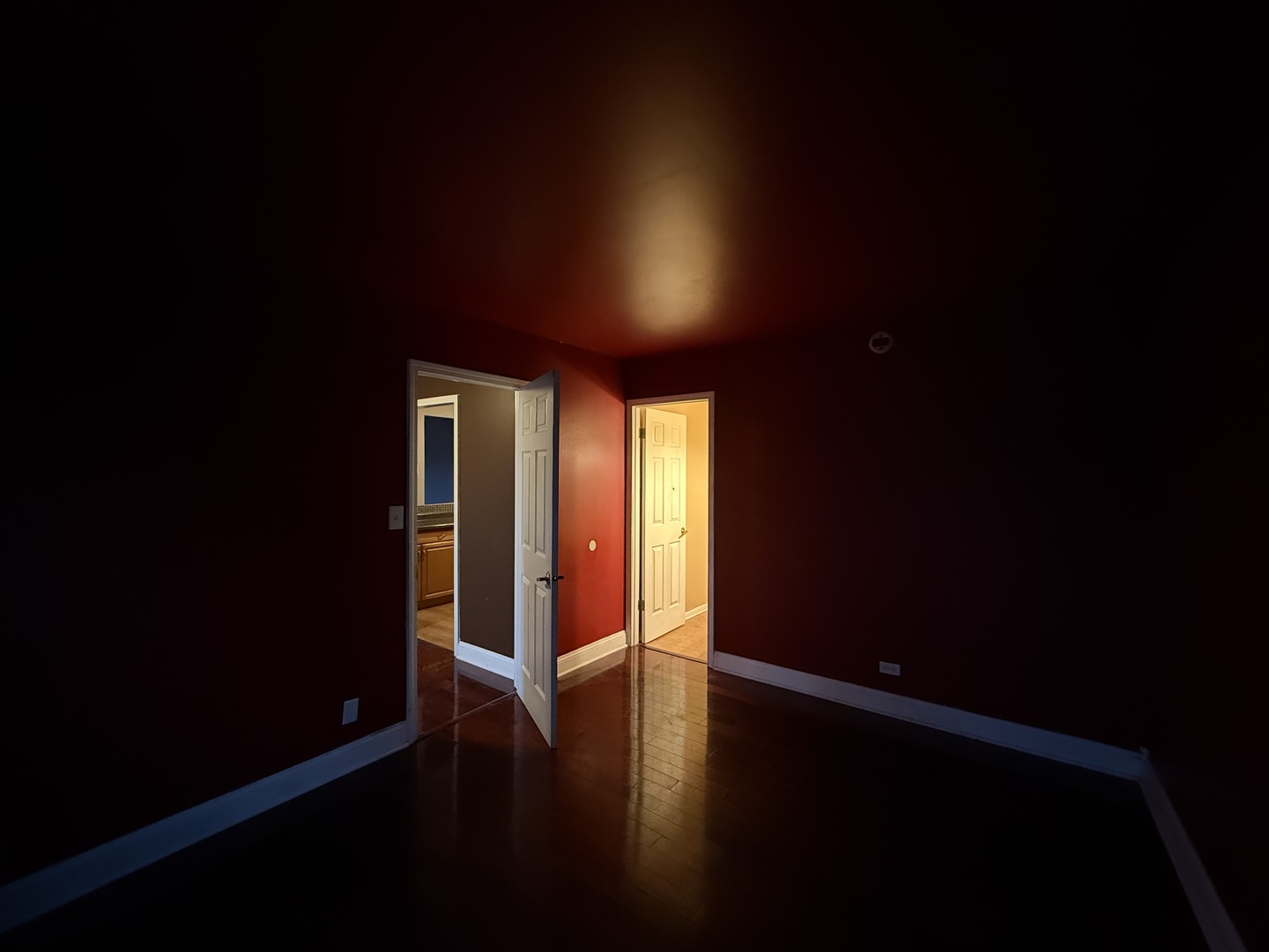 7 East Carriageway Drive, Unit 311 Hazel Crest, IL 60429 - Photo 10 of 17 a empty room with wooden floor and windows