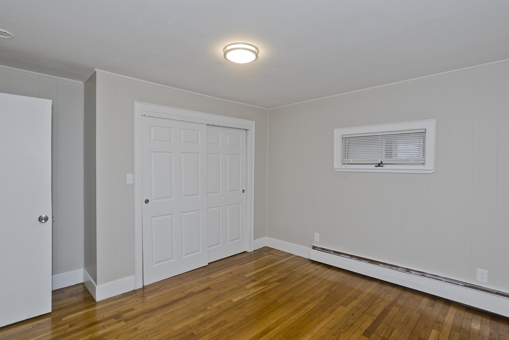 177 Marion Street Chicopee, MA 01013 - Photo 14 of 36 a view of empty room with wooden floor