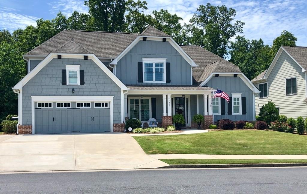 1925 Stone Bridge Lane Kennesaw, GA 30152 - Photo 1 of 1 a front view of a house with a yard