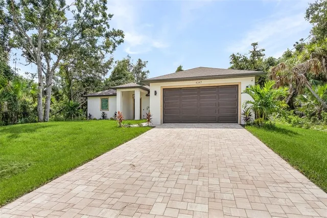 a front view of house with yard