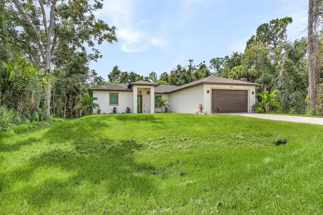 a house view with a garden space