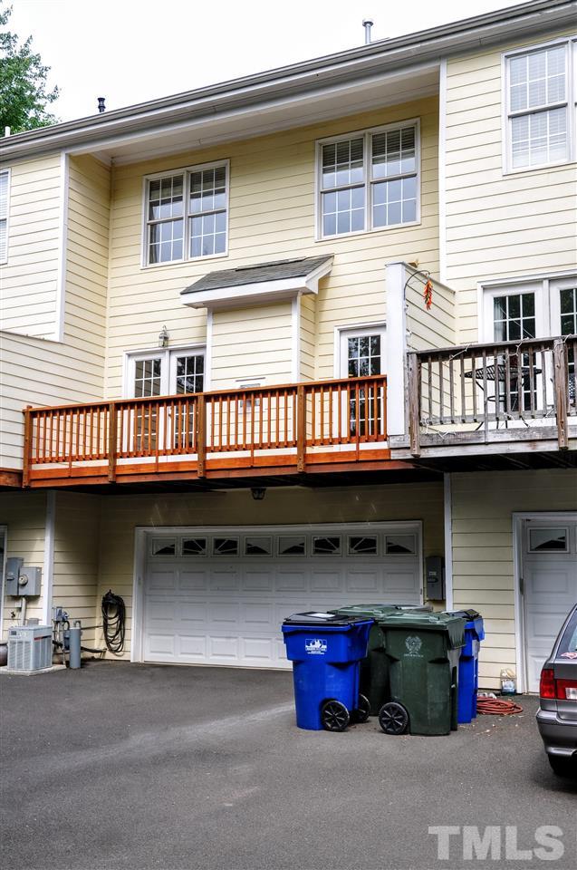 6902 Ray Road Raleigh, NC 27613 - Photo 22 of 23 a front view of a building with retail shop
