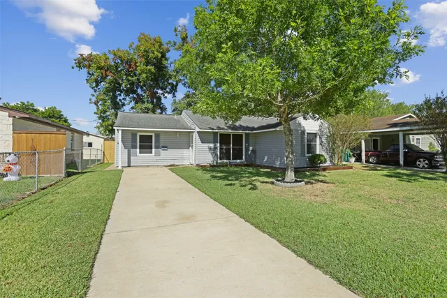 front view of a house with a patio
