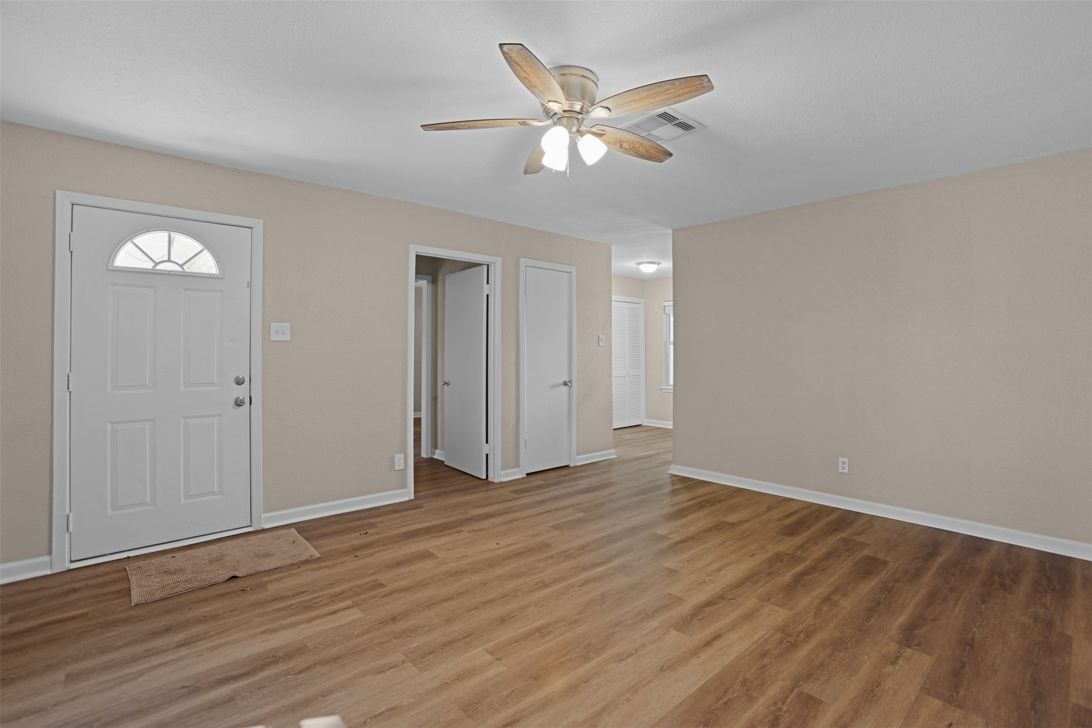 3709 Washington Street Pasadena, TX 77503 - Photo 11 of 22 a view of an empty room with wooden floor