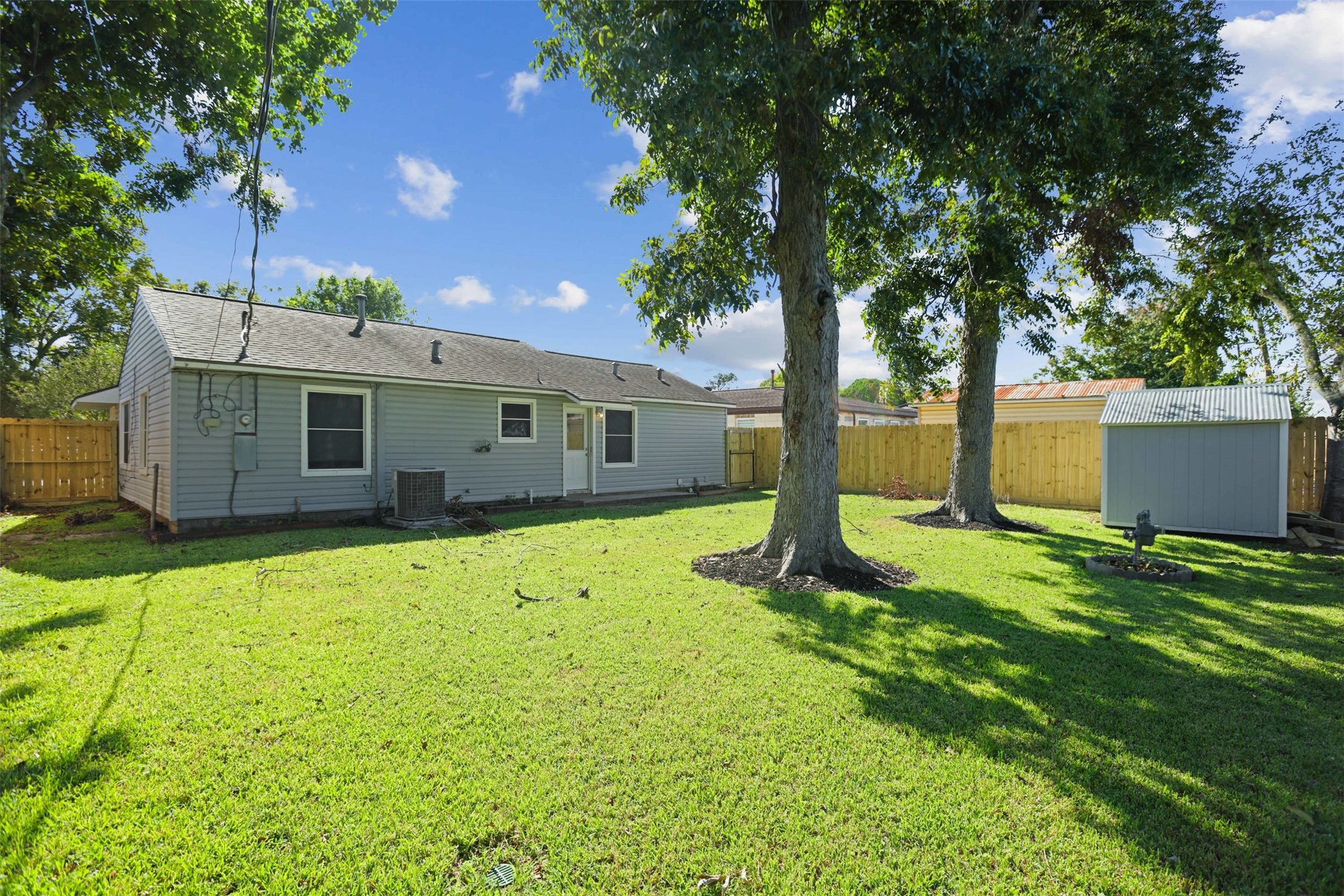 3709 Washington Street Pasadena, TX 77503 - Photo 5 of 22 a view of a house with a backyard