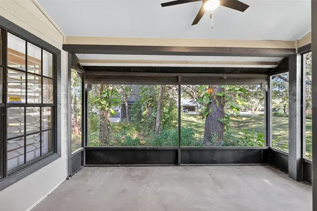 a view of a room with a large window