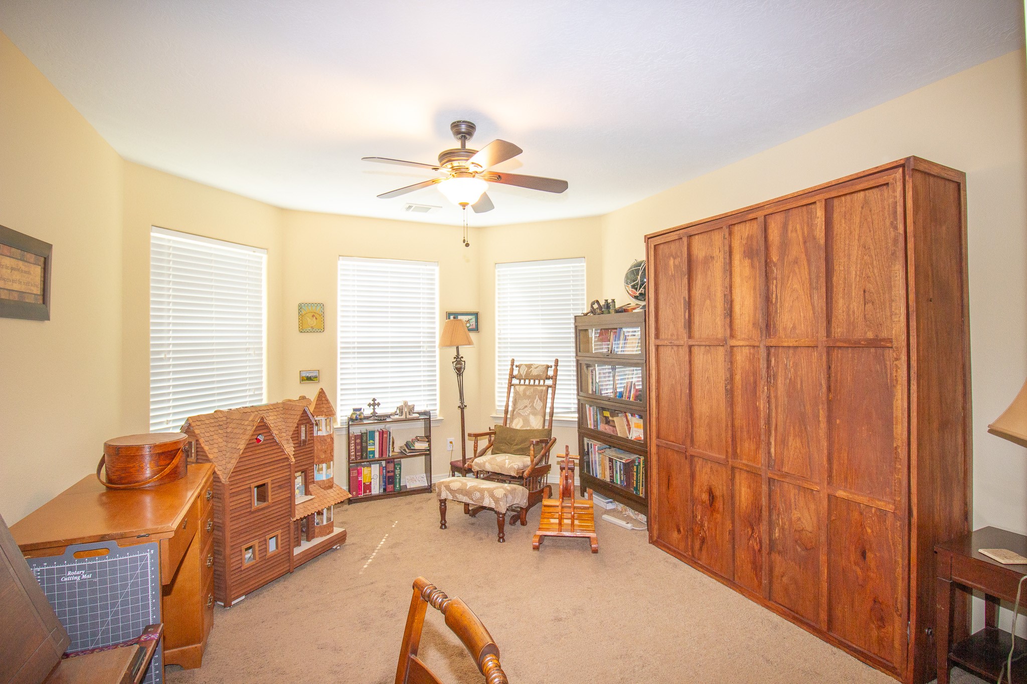 40411 Bosque Road Hempstead, TX 77445 - Photo 14 of 25 Custom Murphy bed crafted from pecan wood sourced directly from the property, adding a unique, personal touch and timeless charm.