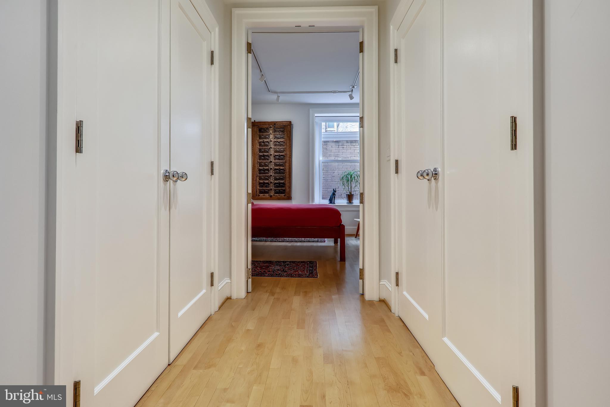 2022 Columbia Road Northwest, Unit 112 Washington, DC 20009 - Photo 21 of 41 Extrawide hallway to bedroom w 2 double closets