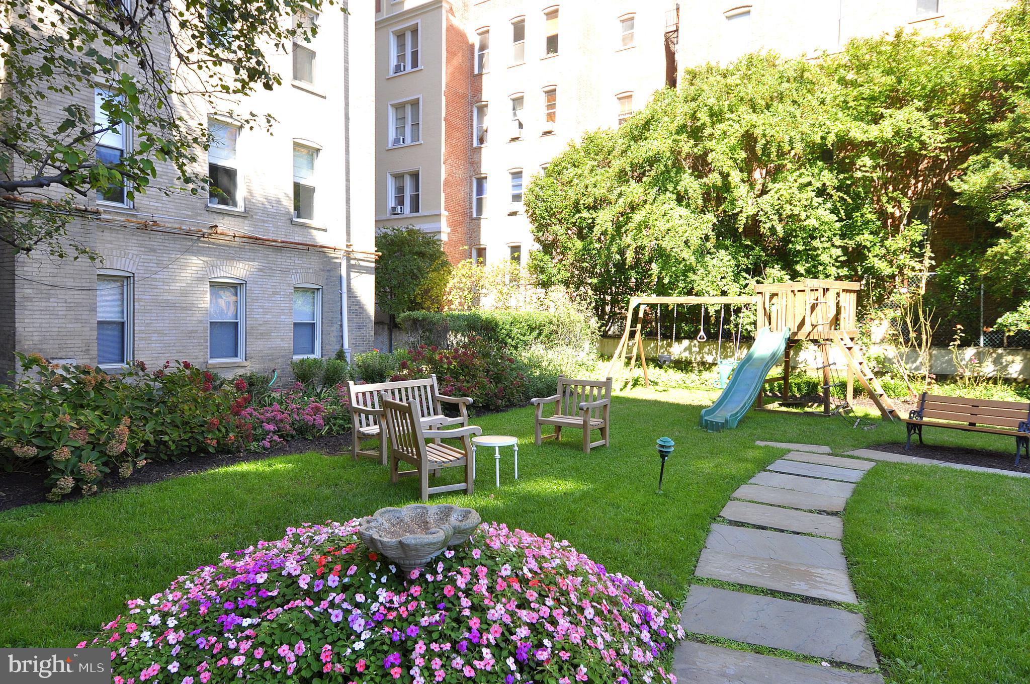 2022 Columbia Road Northwest, Unit 112 Washington, DC 20009 - Photo 34 of 41 Gracious lush rear garden for relaxation and play