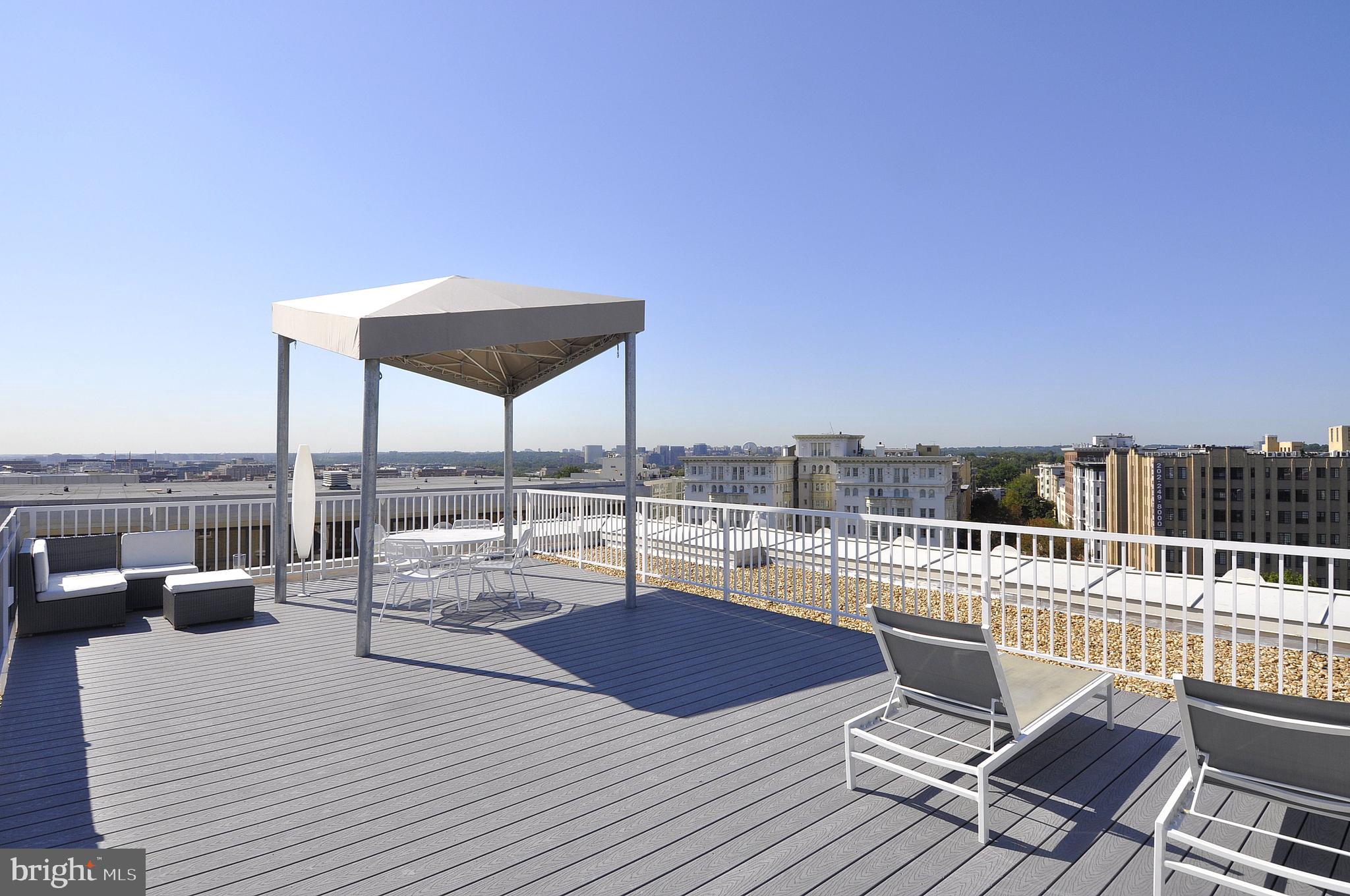 2022 Columbia Road Northwest, Unit 112 Washington, DC 20009 - Photo 38 of 41 Roof deck with awning for taking in the sun