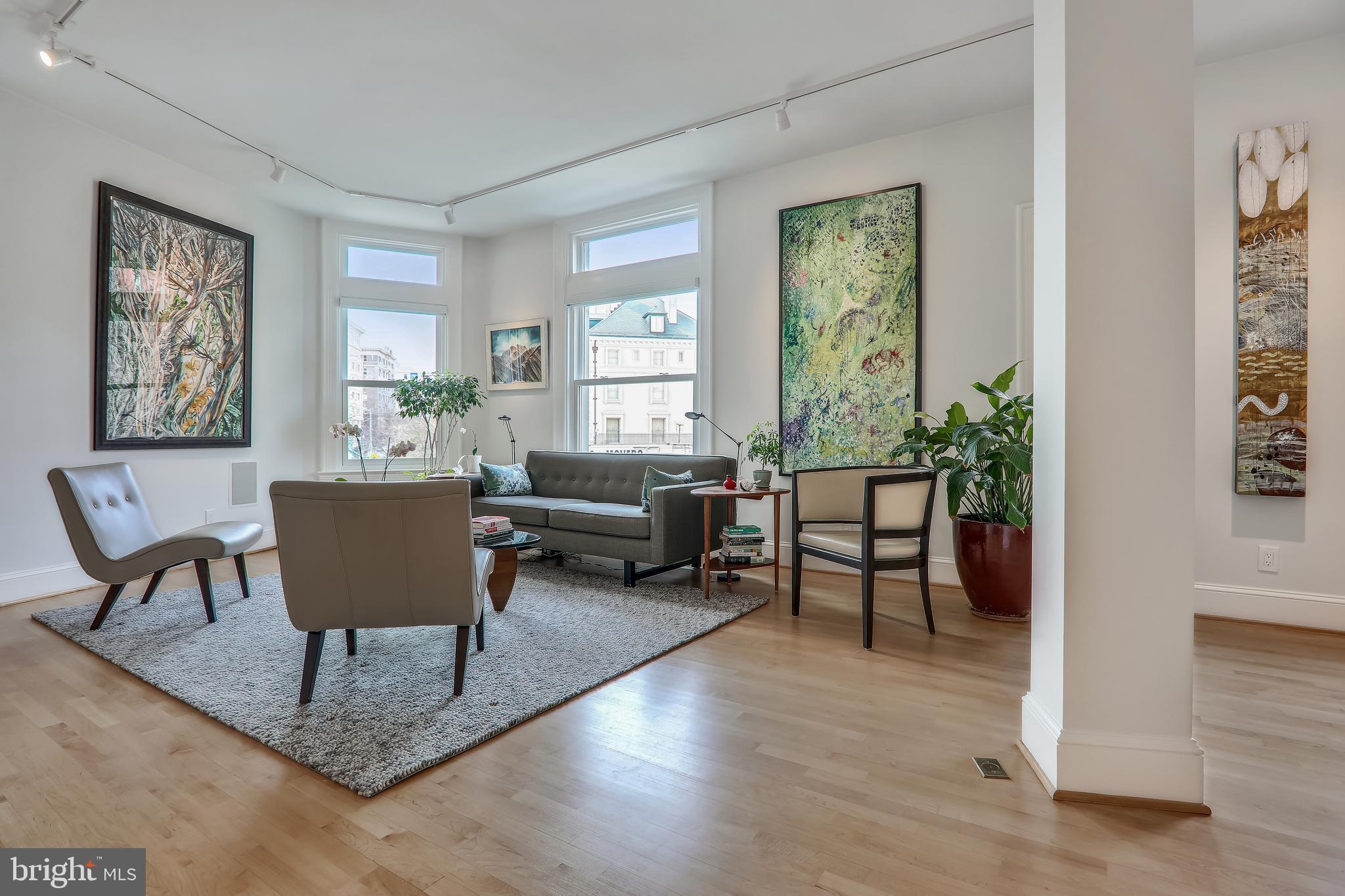 2022 Columbia Road Northwest, Unit 112 Washington, DC 20009 - Photo 8 of 41 Living room features multiple seating areas...