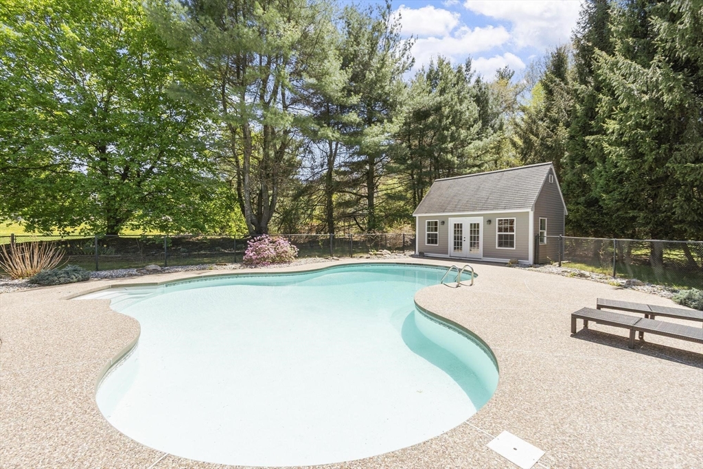 4 Ridge Road Pepperell, MA 01463 - Photo 37 of 42 a view of a house with pool