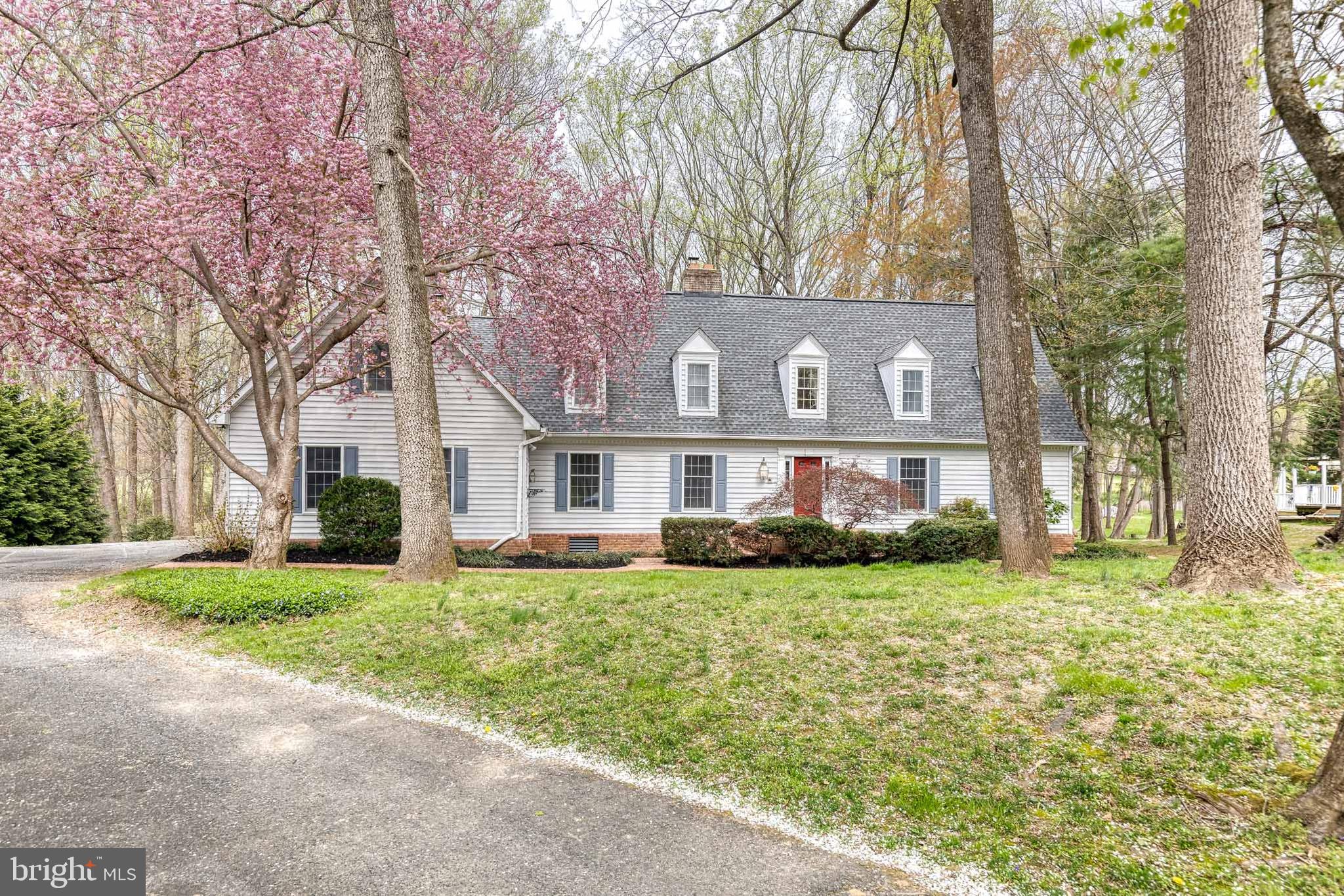 1216 Bonaire Road Forest Hill, MD 21050 - Photo 4 of 71 a view of a house with a big yard and large trees